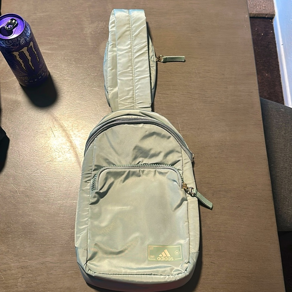 Adidas green cris cross back pack new with out tags